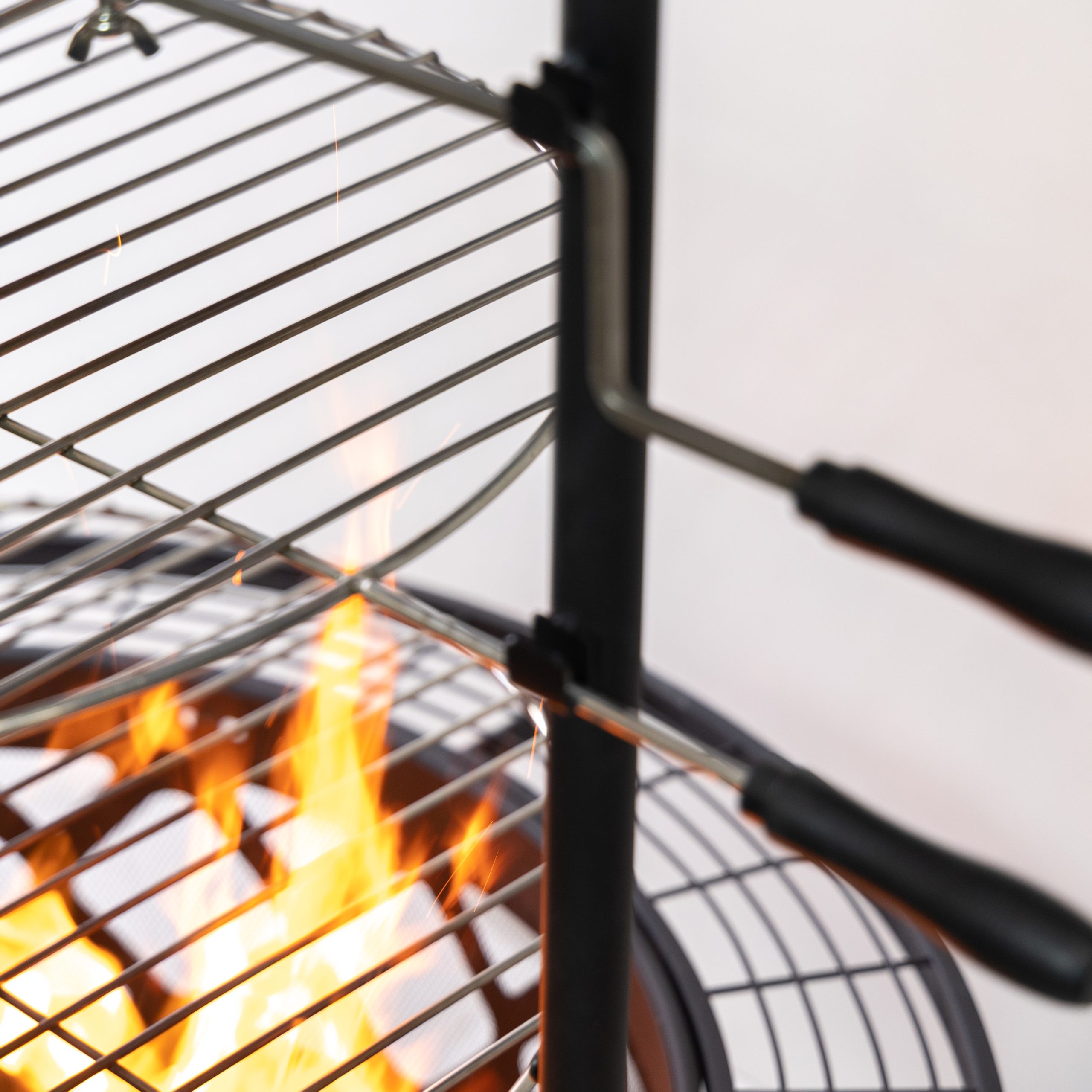 Deko Living 33 Inch Diameter Outdoor Steel Wood Burning Fire Pit with 2 Cooking Grills, Rotisserie and Poker - Image 7
